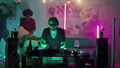 a dj at a lively party