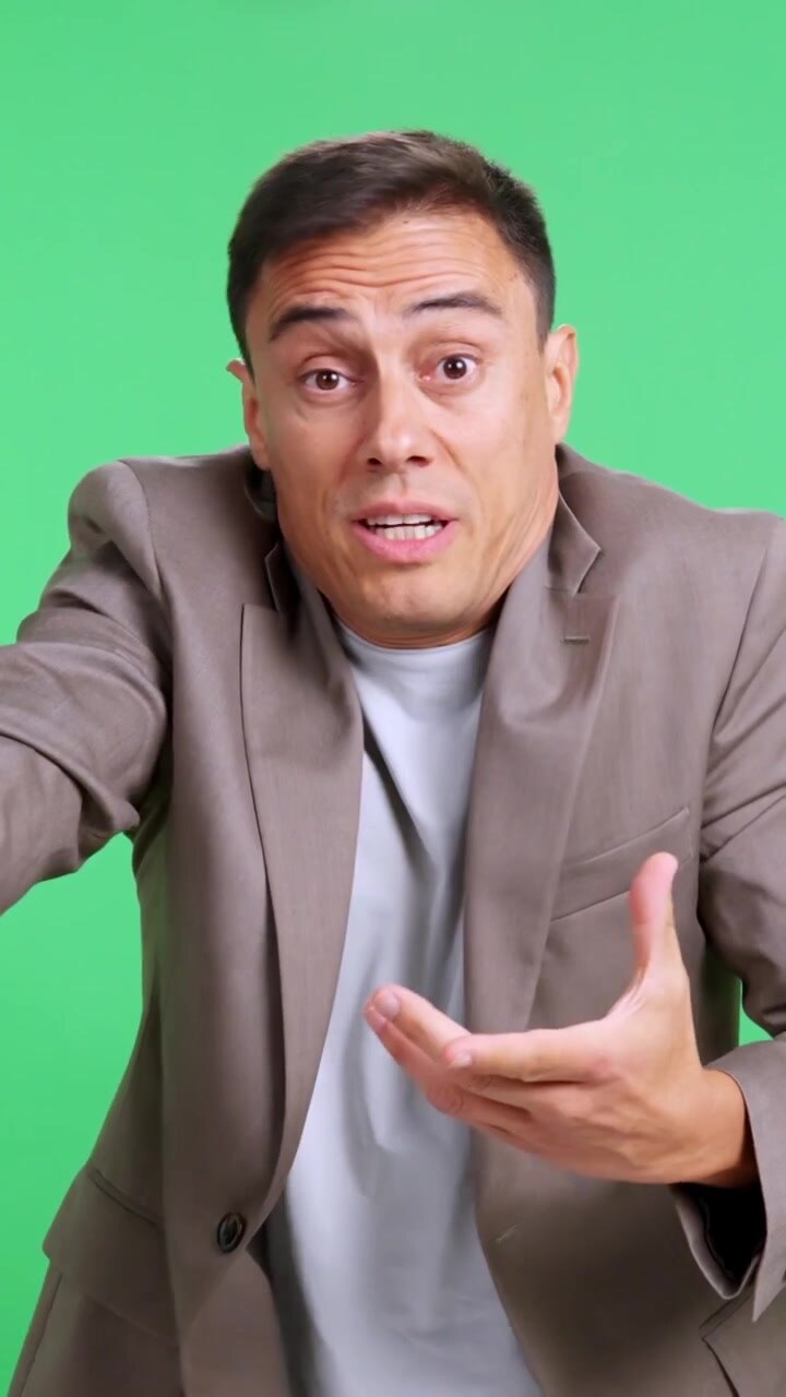 Angry businessman arguing and gesturing on a green screen