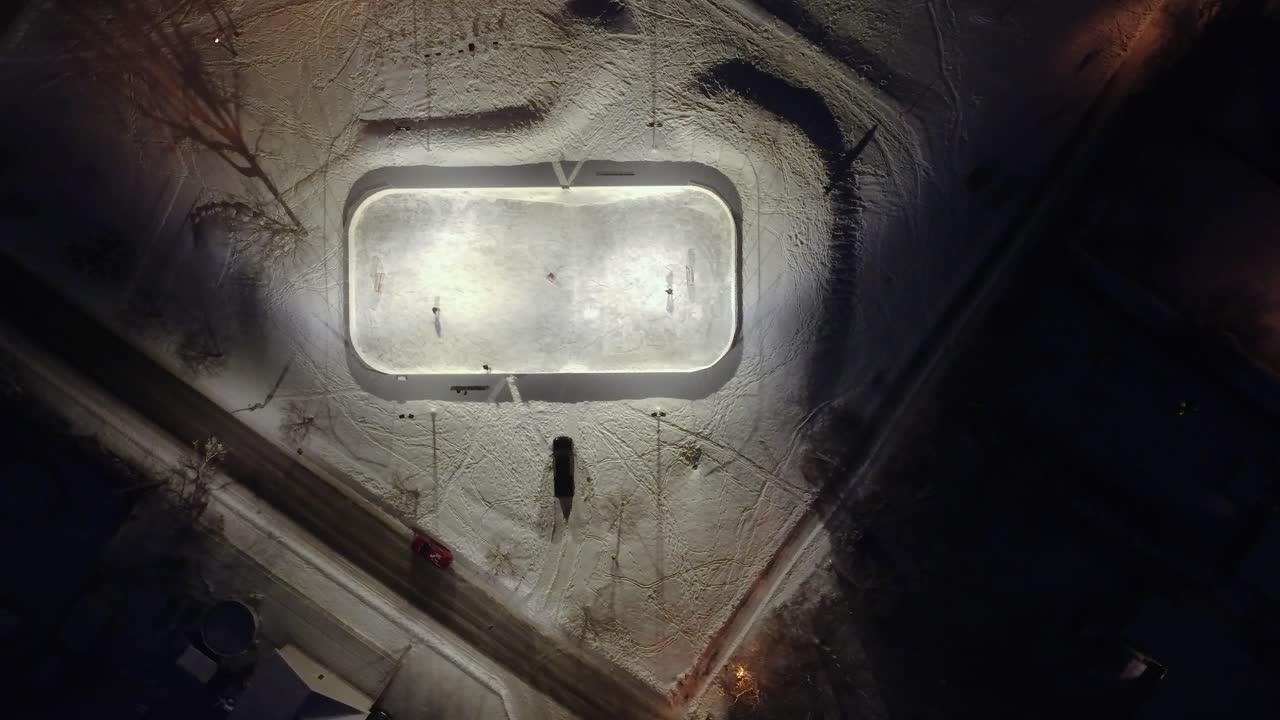 Overhead night shot with snow-covered landscape in St-Constant, Québec, Canada