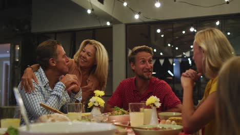 Happy-family-eating-dinner-together.