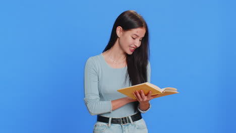 happy caucasian woman reading funny interesting fairytale story book leisure hobby learning study