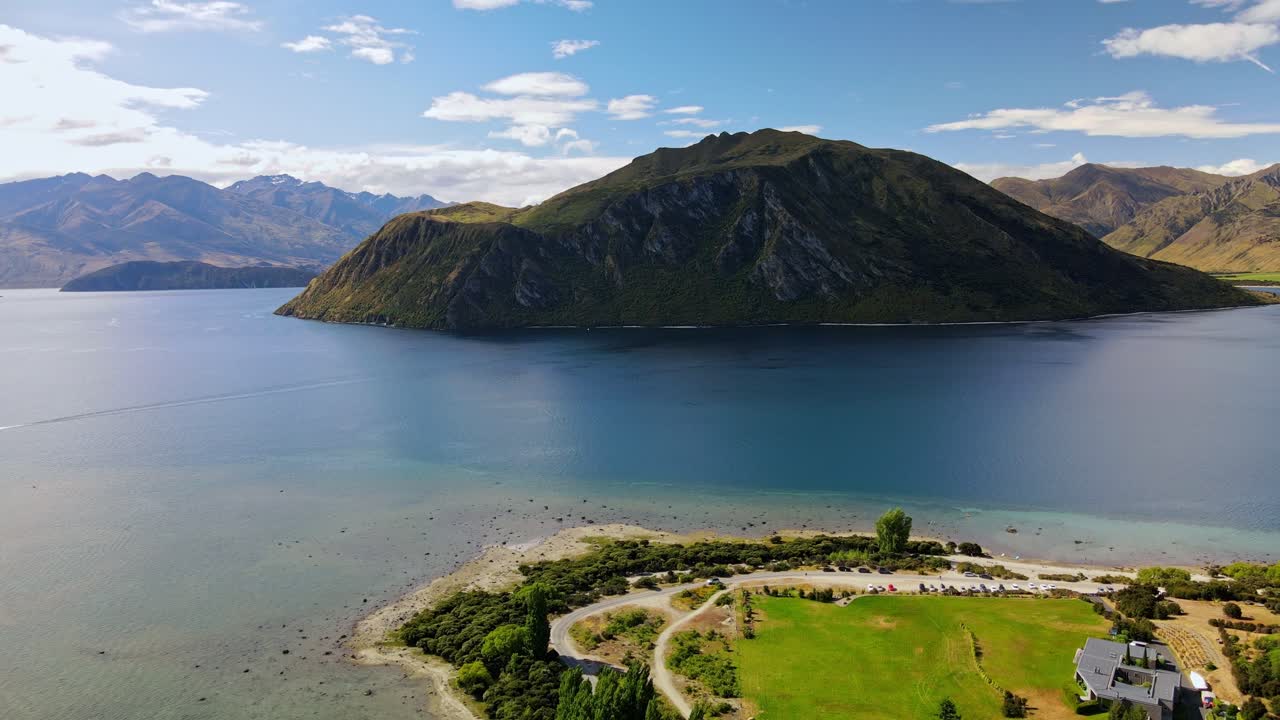 Serene island in Lake Wanaka, Central Otago, New Zealand, peaceful view