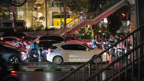 night traffic in a busy city intersection