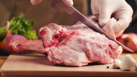 preparing raw lamb leg
