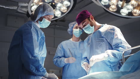 surgeons and nurses during surgery