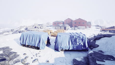 snow covered settlement reveals hidden mysteries of arctic exploration