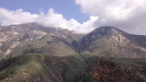 Beautiful-Nature-Scenery-Of-Fluffy-White-Clouds-At-The-Peak-Of-Mount-Baldy-In-California,-USA---aerial-drone