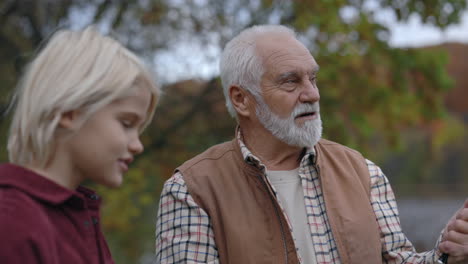 happy intergenerational conversation outdoors