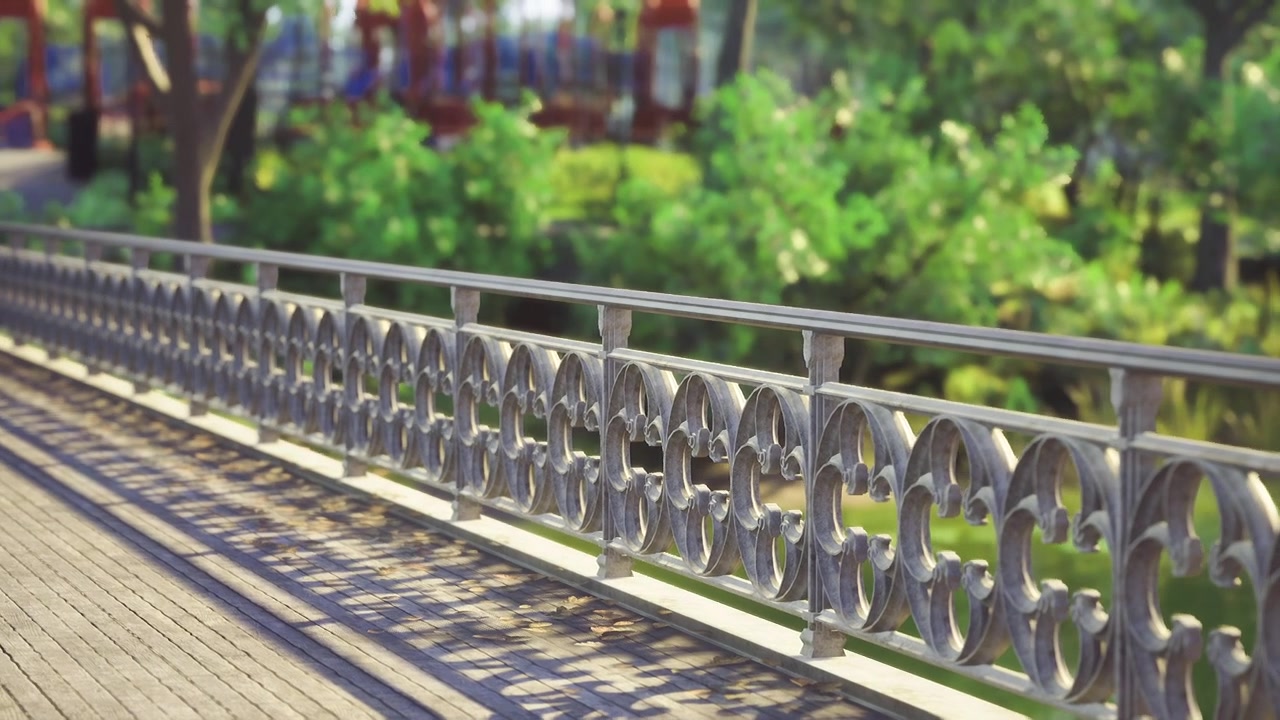 Balustrade logam dekoratif dengan elemen tanaman buram di belakangnya.