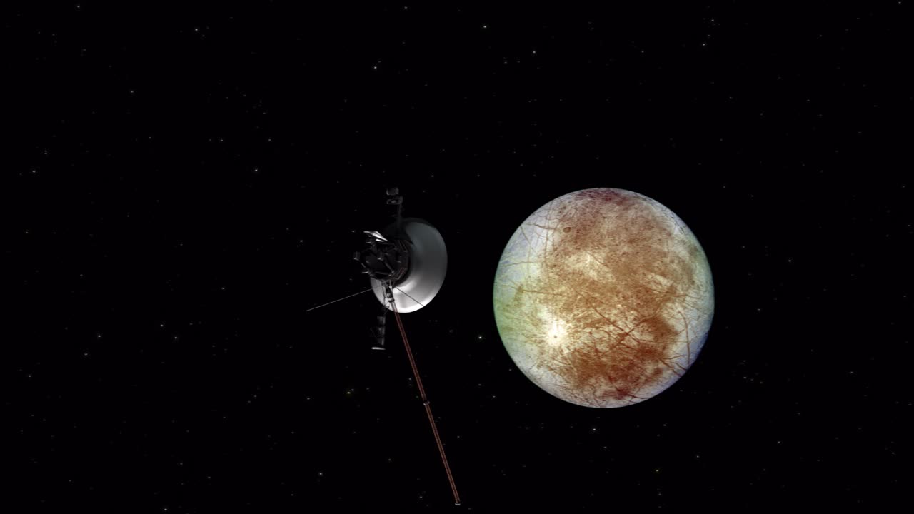 la sonda espacial voyager voló cerca de la luna de júpiter, europa.