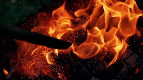 outdoor fire burning. large bright orange campfire burning outside