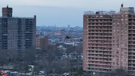 An-aerial-view-over-Calvert-Vaux-Park-in-Brooklyn,-NY-during-a-cloudy-evening