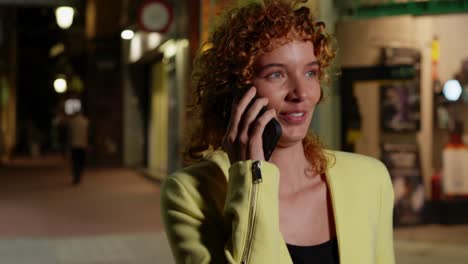 a woman is talking on the phone