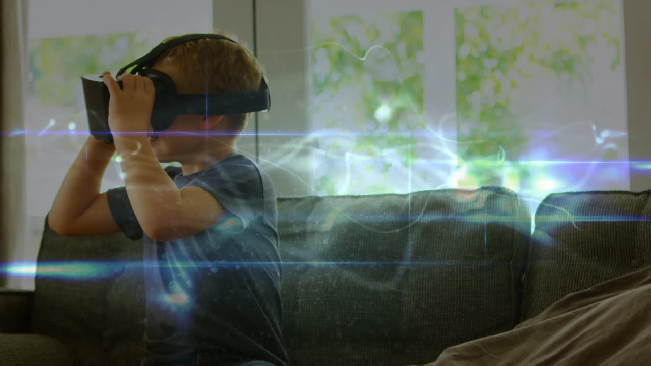 animación de rastros de luz sobre un niño caucásico usando auriculares vr
