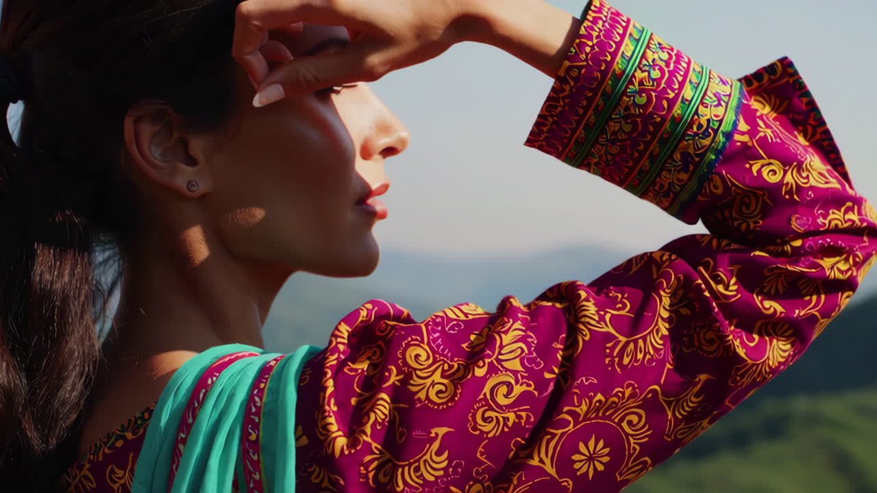 Woman in Traditional Indian Attire on Mountaintop