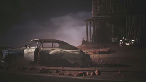 a rusty car abandoned in the desert