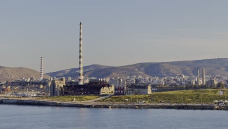 Drapetsona-in-Piraeus,-Greece-as-seen-from-a-moving-ship