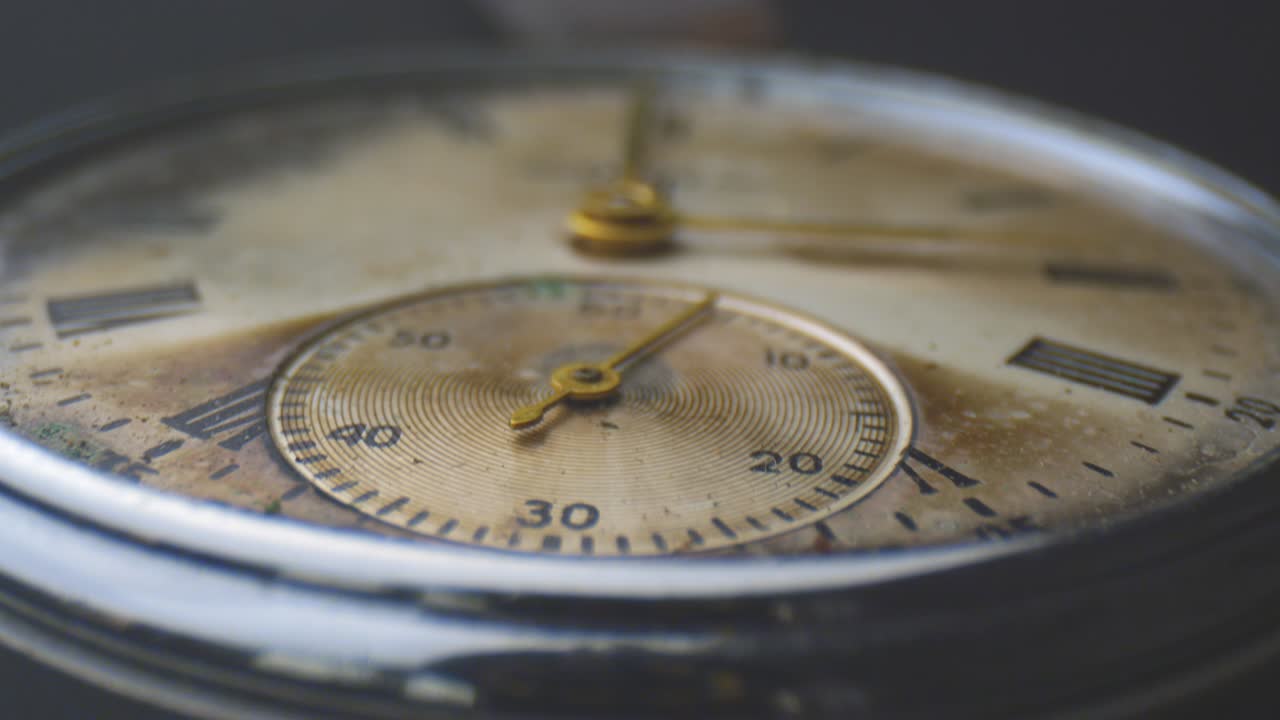 Closeup shoot of old retro aged clock with background isolated on black