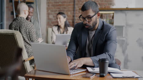 business people working in a coffee shop