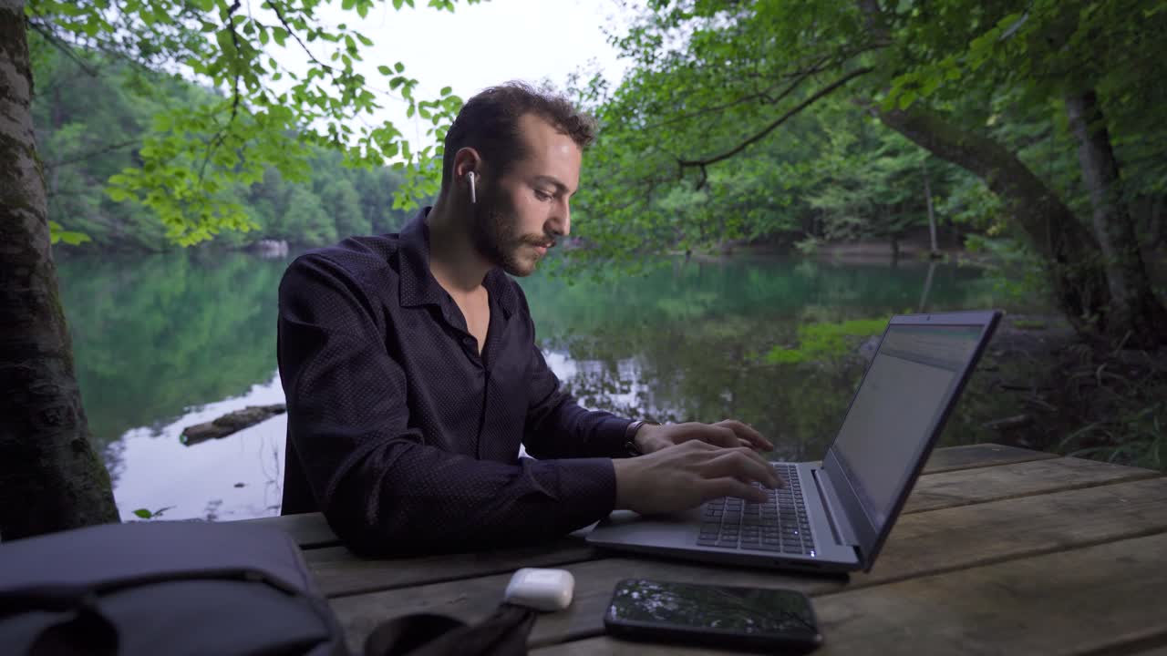 Working with a laptop in nature.