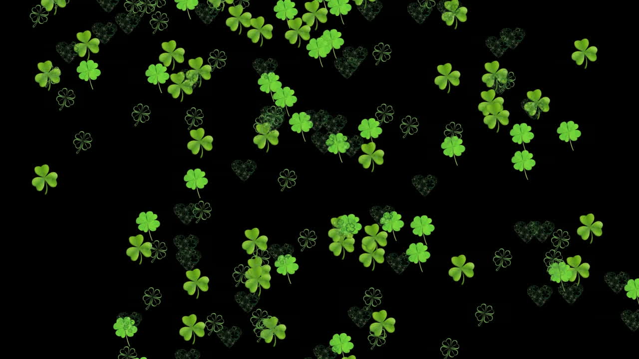 Animation of green clovers falling on black background for St. Patricks day