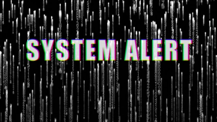 Animation of system alert text over glowing light trails over black background
