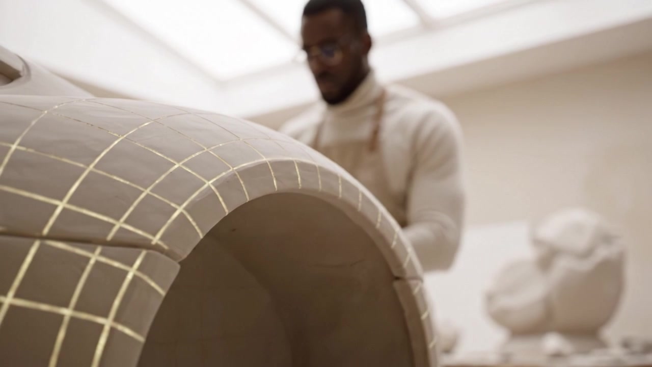 A Skilled Artist Perfects Detailed Shapes in Clay, Showcasing Mastery in Sculpture with Focused Techniques and a Creative Environment Full of Artistic Inspiration
