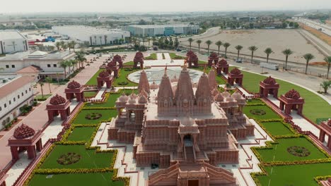 aerial rear sliding view of the baps shri swaminarayan mandir temple in chino hills, california