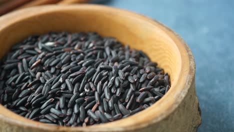 black rice in wooden bowl