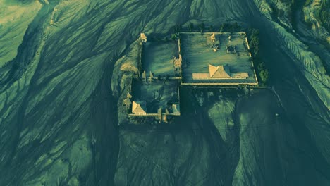 aerial view of hindu temple at the foot of mount bromo crater, indonesia