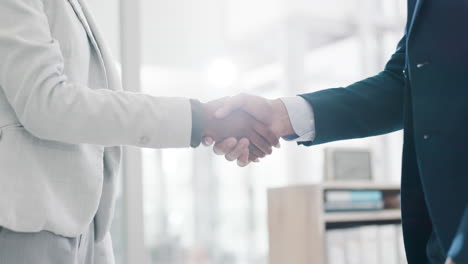 shaking hands at meeting, business people