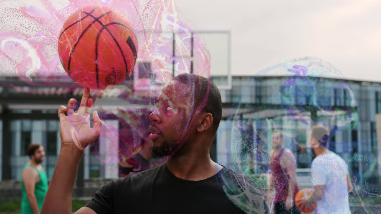Rooftop sportsman picking basketball spinning and generating digital swirls inviting friends