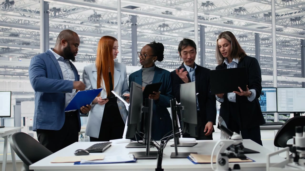 Diverse Business Team Collaborating and Discussing in Modern Office