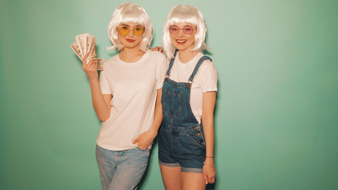 Two Stylish Women with Money