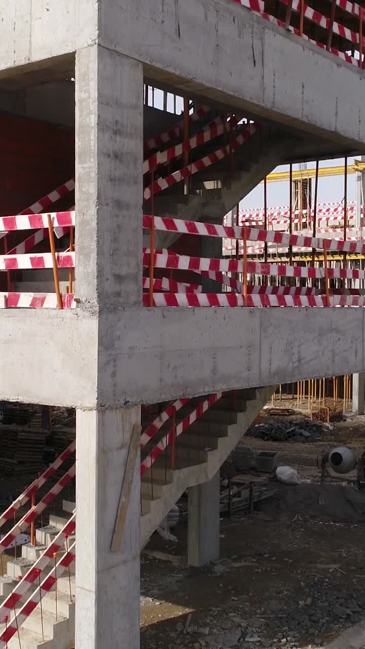 Construction Site with Concrete Structure and Stairs