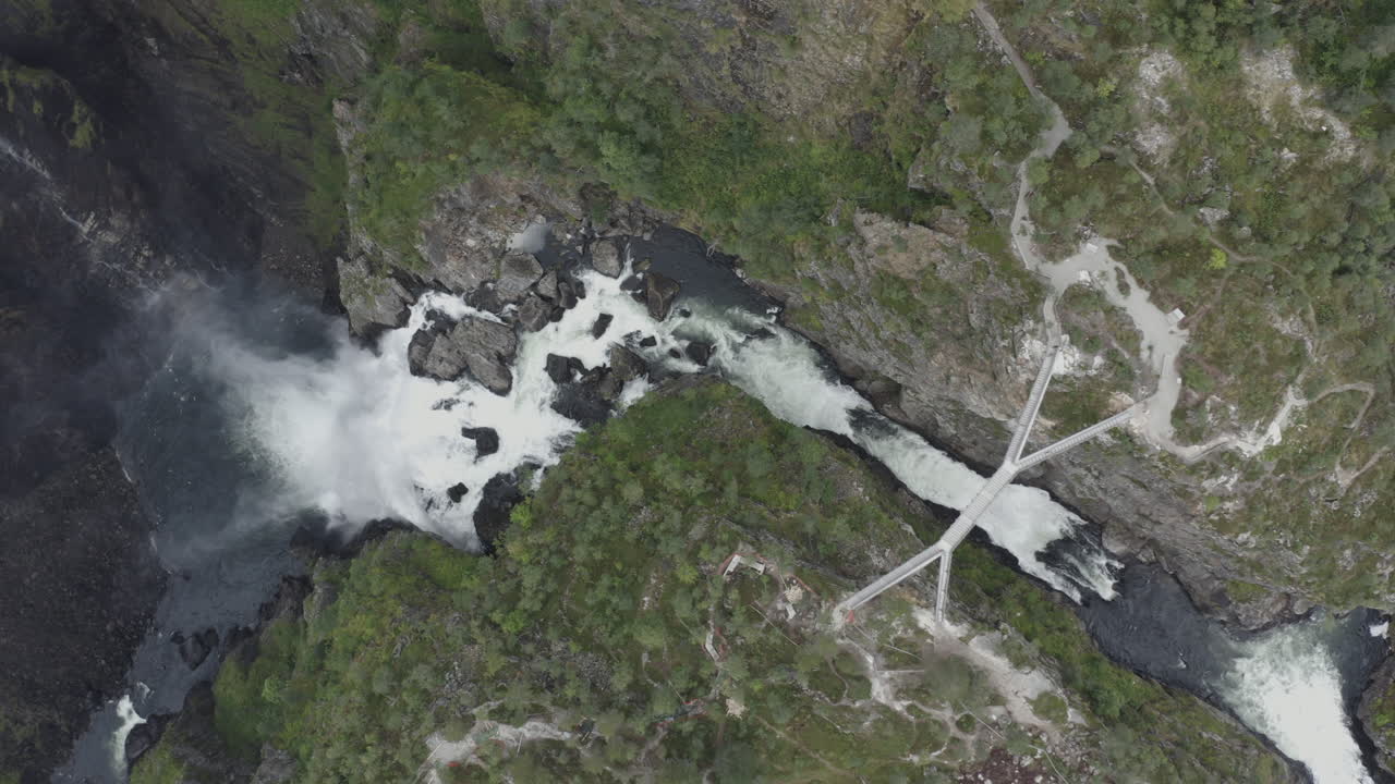 Aerial View of a Waterfall in a Norwegian Mountain Valley