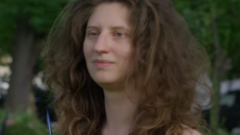 young playful woman putting glasses on the hair