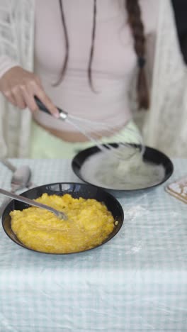 woman baking pumpkin dessert