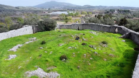 1-million-$-aerial-view-flight-drone-footage-of-a-Overfly-a-castle-ruins-of-a-byzantine-fortress-of-13th-century-wild-nature-Corfu-Greece