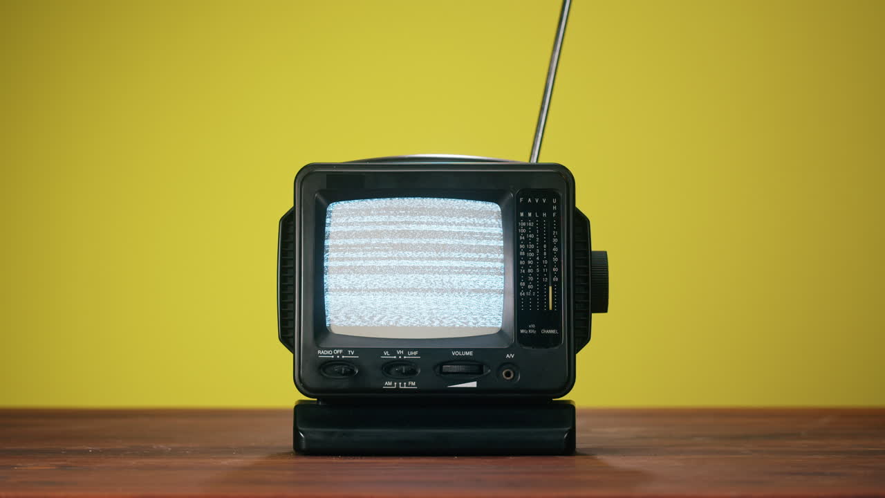 Vintage Portable Television with Static