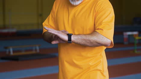 senior man with fitness watch