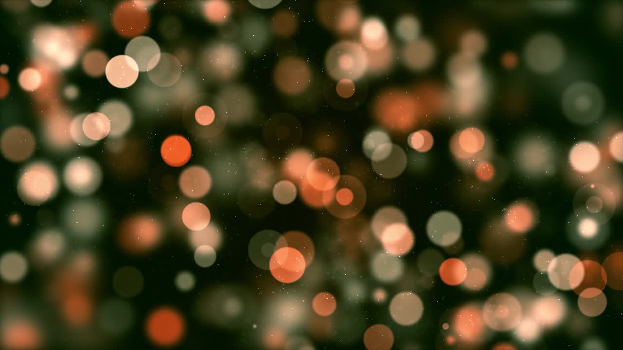 recursos gráficos: pequeñas luces desenfocadas que se mueven lentamente sobre un fondo oscuro