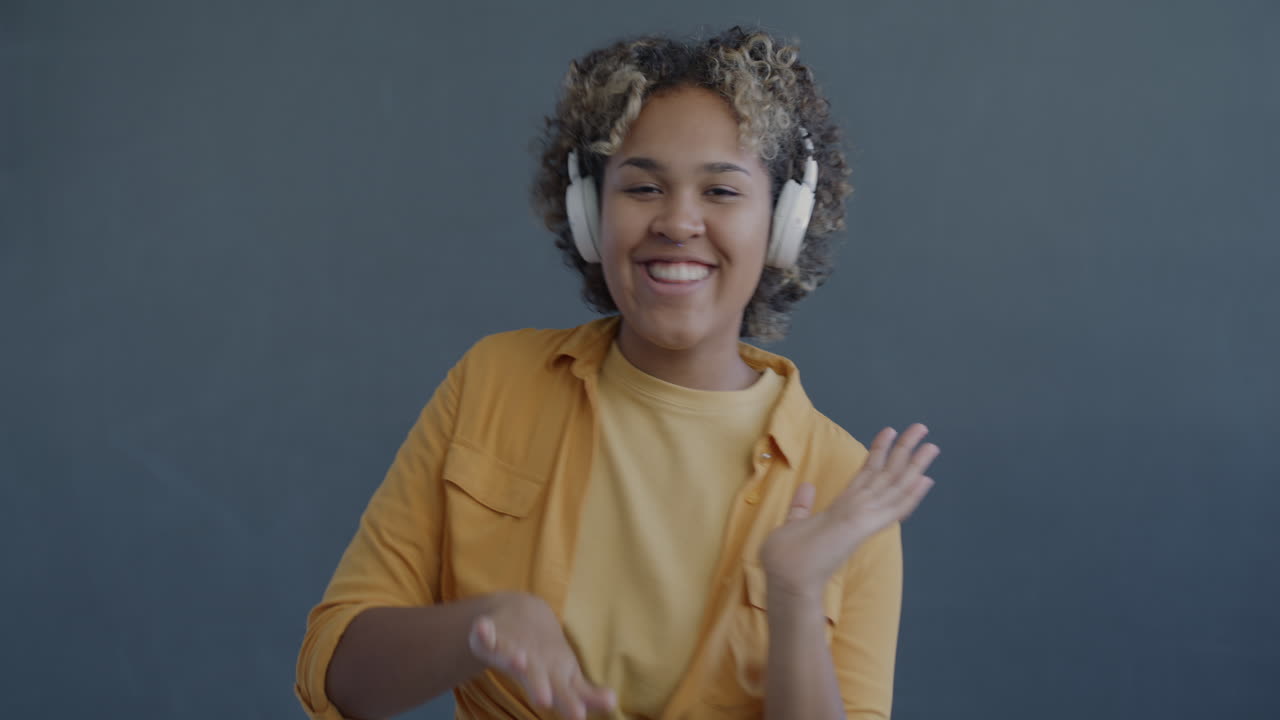 Woman Dancing to Music with Headphones