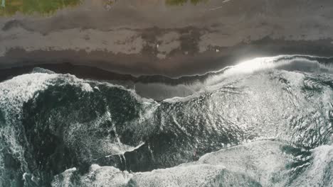 Top-View-Of-The-Glistening-Ocean-During-Summer-In-El-Paredon,-Guatemala