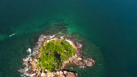 tropical island in the open sea view from above.