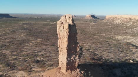 high altitude drone aerial video footage of impressive rock formation vingerklip, namibia, africa. tall stone monument in african desert. monument valley look alike. vast namibian outback.