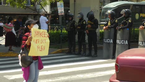 peruvian protest: police and demonstrators face off in lima