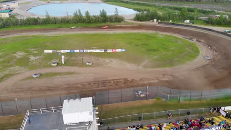 4k drone video of stock car racing at mitchell raceway in fairbanks, ak during sunny summer evening-5