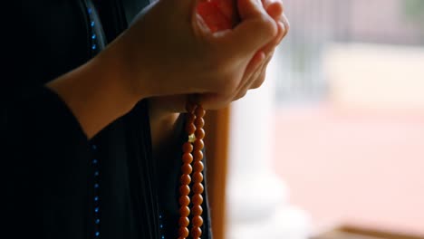 woman in hijab praying 4k