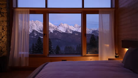 bedroom view of snow-capped mountains